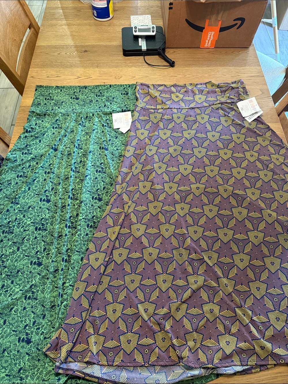 LuLaRoe Maxi Skirts in Green & Purple Printed Patterns with an Caroline cardigan